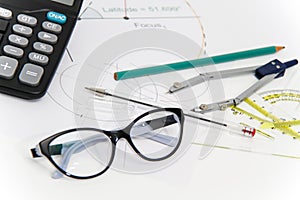 Business Architectural project, pair of compasses, glasses, rulers and calculator
