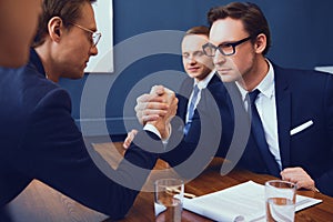 Business armwrestling in office