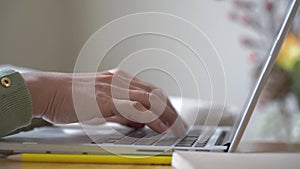 Business asian woman using laptop computer at desk, Female hands typing on notebook with keyboard working at home