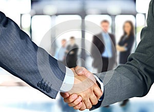 Business associates shaking hands