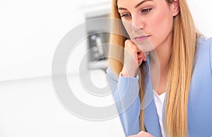 Business attractive woman working on laptop at workplace or at home.