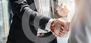 Business background of businessman having handshake