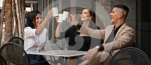 Business background of businesspeople having fun together with coffee at coffee shop outdoors