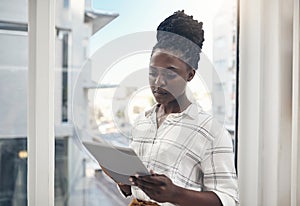 Business, black woman and tablet with typing, connection or contact with digital app or social media. African person