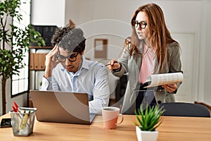 Business boss angry with stressed employee at the office