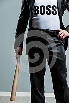 Business Boss concept holding a baseball bat