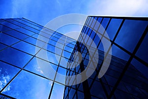 Business Building Highrise Mirrored Windows with Sky and Clouds