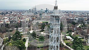 Business buildings against the backdrop of an ancient observation tower in Milan