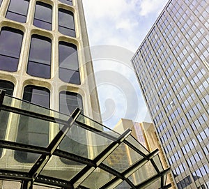 Business buildings with pattern of windows on blue sky background