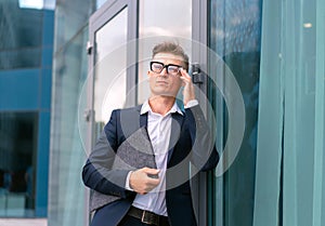 Business. Businessman Glasses Standing City Street Near Office Building