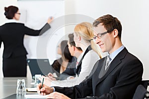 Business - businesspeople, meeting and presentation in office