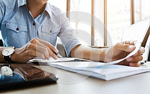 Business calculate data chart documents on the desk at the office