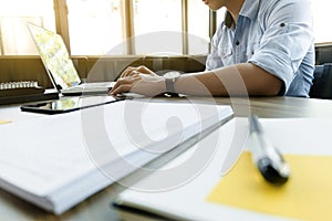 Business calculate data chart documents on the desk at the office photo