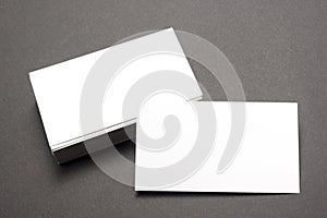 Business card blank over office table. Corporate stationery branding mock-up