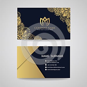 Business card - gold floral frame and lotus logo and gold paper on dark blue background