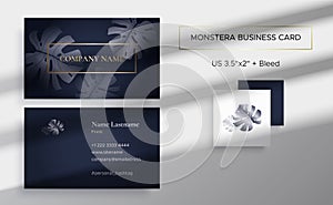 Business card in graphite color with Monstera