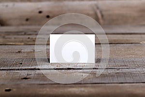 Business cards isolated on old wood background