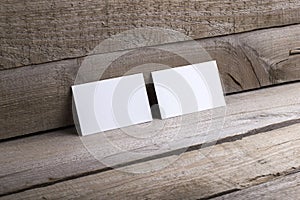 Business cards isolated on old wood background