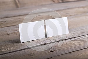 Business cards on old wood background