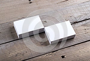 Business cards on old wood background