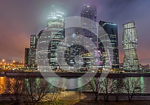 Business Center Moscow City at night in the fog.