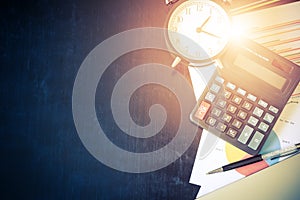 Business chart analysis report with pen, calculator and alarm cl