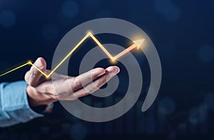 Business Chart Arrow Glowing on Stock market Analysis Data and Trading statistic value economic on hand index fund and money