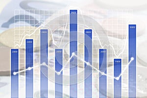 Business Chart Overlaid on International Currency