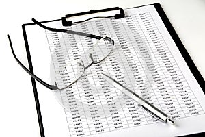 Business chart, pen and glasses on the white background
