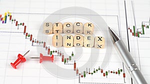 Business chart of quotes and cubes with the inscription - stock index