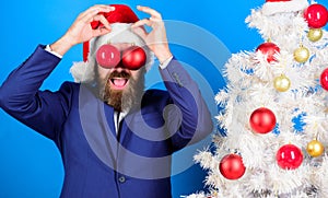 Business and christmas concept. Santa hold christmas ball decoration. Holidays meant for fun. Businessman join christmas