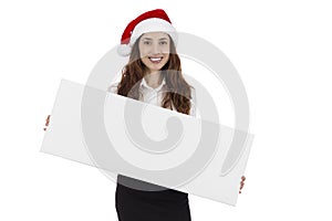 Business christmas woman presenting a blank billboard with copy