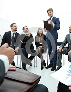 Business coach communicate with the business team