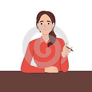 Business coach woman talking and explaining something to the viewer with pen on her hand