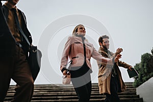 Business colleagues in casual attire walking outdoors with confidence