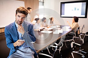 Business colleagues in conference meeting room presentation