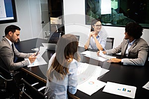 Business colleagues in conference meeting room presentation