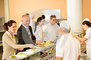 Business colleagues cook serve lunch canteen food