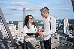 business colleagues discussing working documents in the business center.