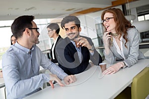 Business colleagues having conversation during coffee break