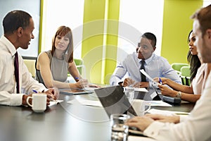 Business colleagues at an informal meeting, close up