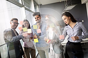 Business colleagues in conference meeting room during presentation