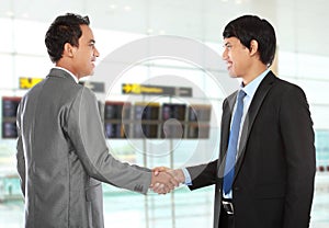 Business colleagues shaking hands