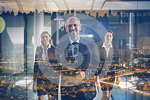 Business colleagues walking together in office corridor