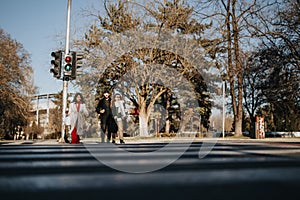 Business colleagues walking together on a sunny winter day for a meeting