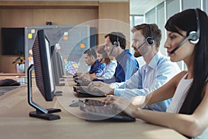 Business colleagues working at call center