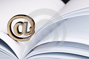 business communication mail technology concept. email symbol over notepad background