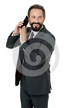 Business communications. Wait a minute. Busy with conversation. Businessman formal suit holds smartphone. Man bearded