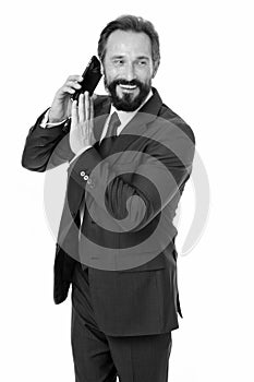 Business communications. Wait a minute. Busy with conversation. Businessman formal suit holds smartphone. Man bearded