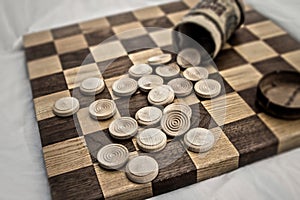 Business competition chess board concept in grainy faded old time look.